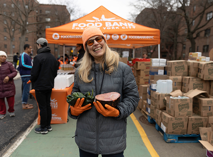 A volunteer smiling. Links to Gifts by Will will.jpg