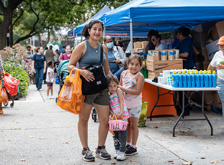 A mother and her daughters at a Food Bank For NYC pantry. Links to Gifts of Cash, Checks, and Credit Cards cash.jpg
